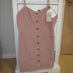 Pink corduroy dress with buttons